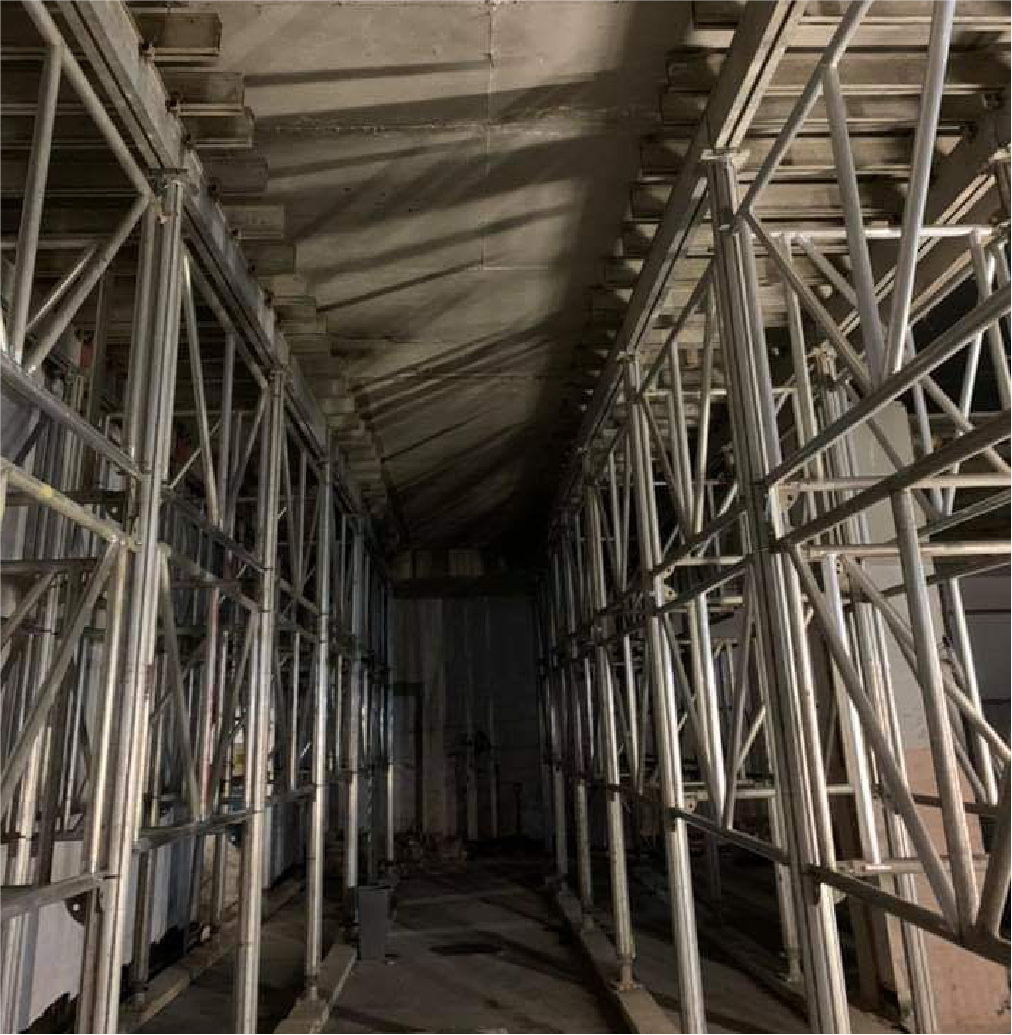 inside coventry point building with extensive metal propping as part of temporary works.